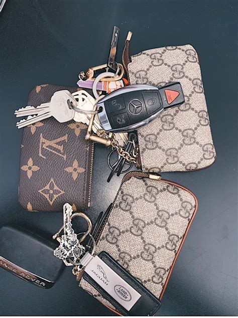 louis vuitton pom pom keychain replica|false louis vuitton prints.